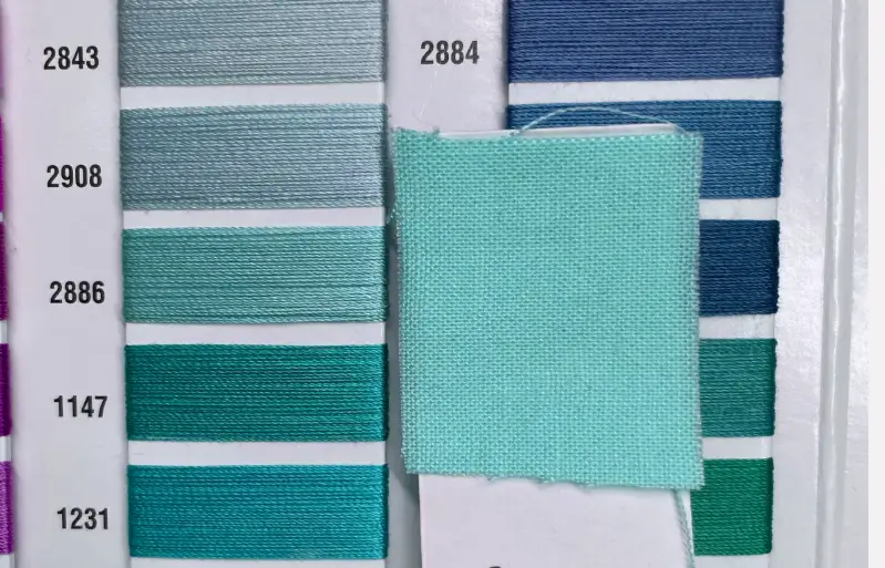 Thread color matching with fabrics